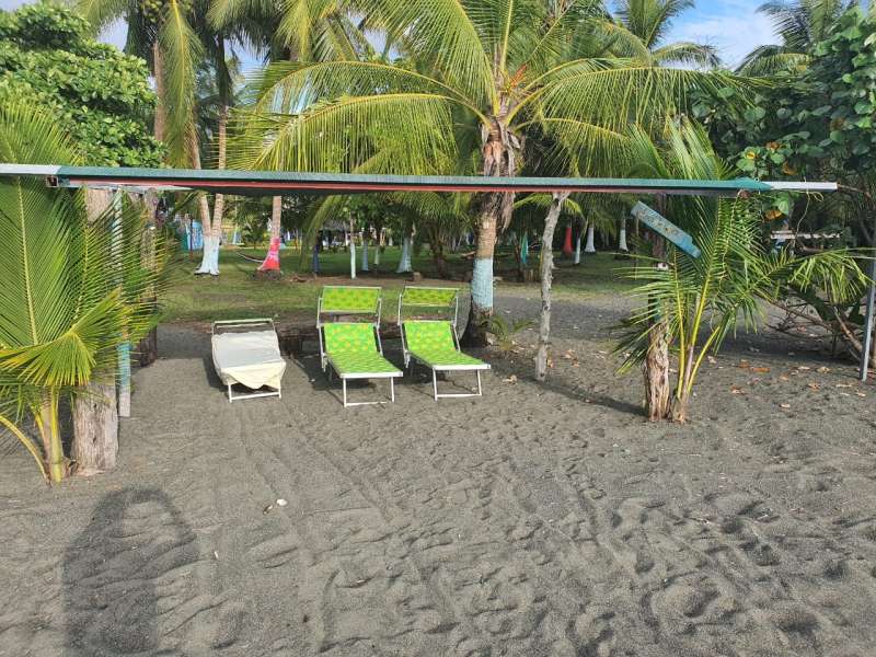Beachfront home and cabins in Zancudo