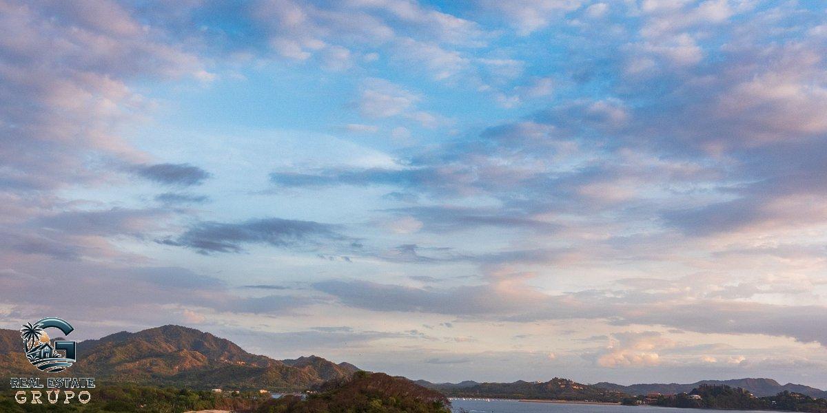 Aerial coastal view with clouds - pavones costa rica real estate